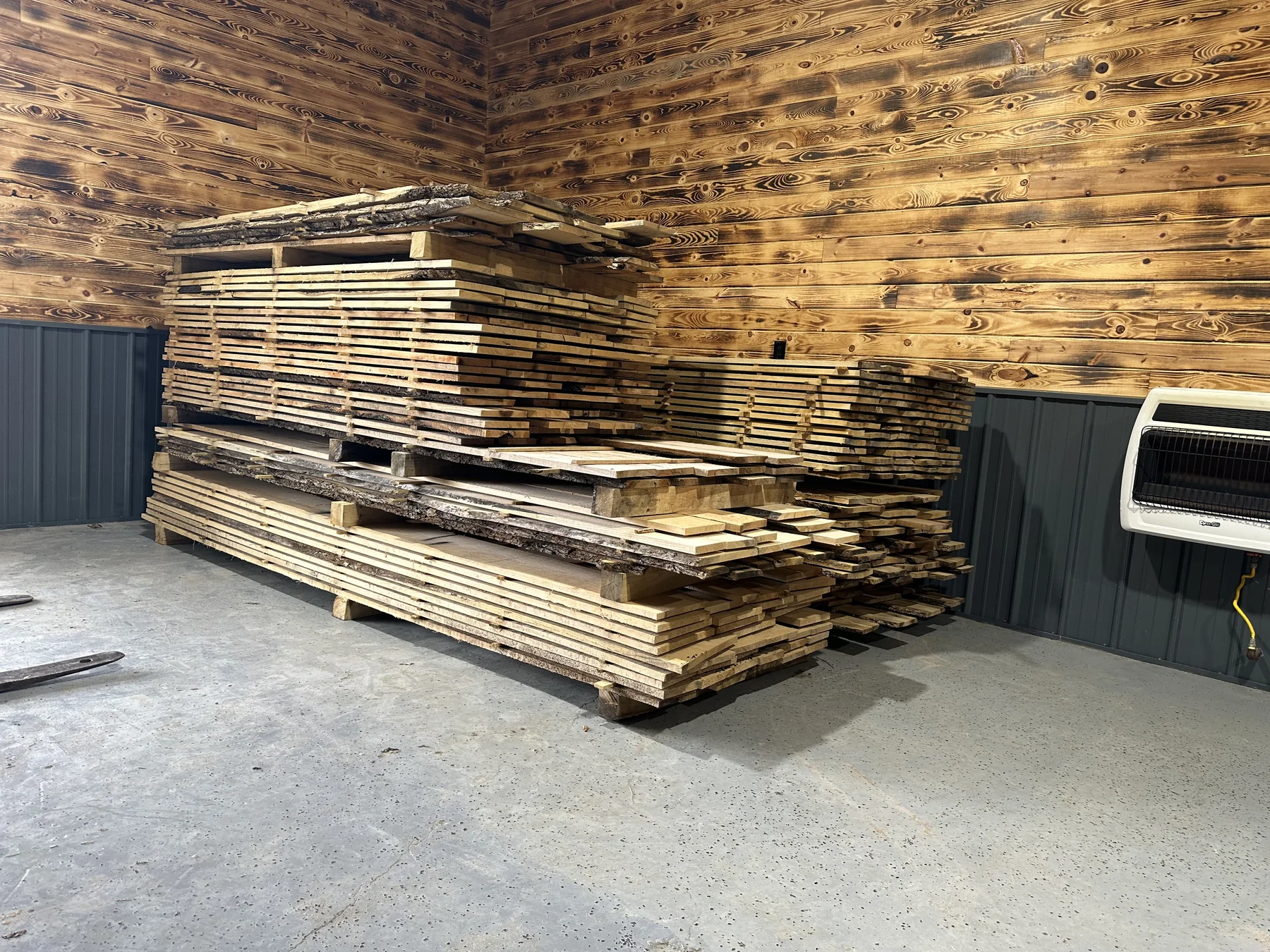 Stacks of custom milled lumber and slabs